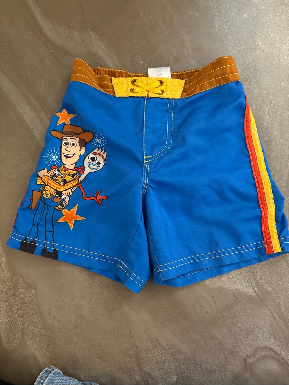 Disney Toy Story Blue Swim Shorts with Yellow & Red Stripe